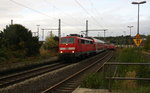 111 112 DB kommt mit dem RE4 Verstärkerzug von Düsseldorf-Hbf nach Aachen-Hbf  und kommt aus Richtung Neuss-Hbf,Mönchengladbach-Hbf,Rheydt-Hbf,Wickrath,Beckrath,Herrath,Erkelenz,Baal,Hückelhoven-Baal,Brachelen,Lindern,Süggerrath,Geilenkirchen,Frelenberg,Zweibrüggen,Übach-Palenberg,Rimburg,Finkenrath,Hofstadt und fährt in Herzogenrath ein und hält in Herzogenrath und fährt dann weiter in Richtung Kohlscheid,Richterich,Laurensberg,Aachen-West,Aachen-Schanz,Aachen-Hbf. Aufgenommen am Bahnhof von Herzogenrath. 
Am Nachmittag vom 13.10.2016.