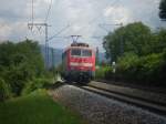 111 064 fhrt solo in Richtung Basel. 
Kurz nach Freiburg St.Georgen.