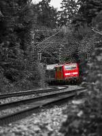 111 023 mit RE von Innsbruck nach Mnchen Hbf am 20.08.2010 kurz nach Tutzing am Starnberger See.