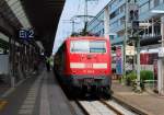 Die DB 111 061-8 mit RE 31010 (Basel Bad Bf - Offenburg Hbf) hier bei aufenthalt in Freiburg (Brsg) am 26. 07 2010.