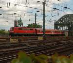 111 119 der DB kommt am 07.08.2011 mit Nahverkehrszug ber die Hohenzollernbrcke, und fhrt gleich in den Hbf Kln ein.