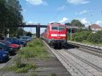 Hier ist 111 054 mit einer RB nach Basel Bad Bf bei der Ausfahrt in Orschweier. (29.05.2012)