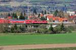 Unbekannte Br 111 mit RE 4263 nach Mnchen Hbf kurz vor Regensburg-Prfening, 10.04.2012
