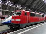 DB Regio 111 191 und im Hintergrund ein TGX am 30.07.14 in Frankfurt am Main Hbf 