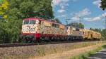 SMARTRAIL 111 057 und 111 108 mit einem Bauzug in Freilassing, am 3. Juli 2026.