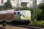 Den  Mnchen - Salzburg - Express  bespannte am 31.05.2011 die 111 039-4  DAV  hier am mnchner Heimeranplatz am Weg zum Hbf.