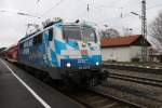 Die ``Bahnland-Bayern-Lok`` 111 017-0 mit RE Mnchen-Salzburg im Bahnhof Aling am 2.12.2012.