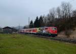 111 024 mit einer RB nach Mnchen am 04.04.2013 bei Huglfing.