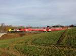 Die 111 024 mit einem RE am 31.12.2012 unterwegs bei Fahlenbach.