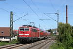 111 060-0 mit dem RE 19059 (Lauda-Stuttgart Hbf) in Walheim 25.4.19