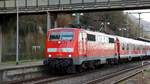111 100 mit Fußballsonderzug RB 38977 nach Sinsheim beim Halt in Heidelberg-Altstadt. Aufgenommen am 15. Februar 2020.