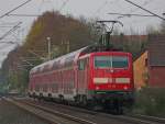 RE10135 aus Aachen nach Dortmund Hbf mit Schublok 111 116 zwischen Geilenkirchen und Lindern am 14.4.10