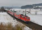 111 065 mit einem RE nach München am 27.02.2013 bei Ergoldsbach.
