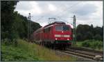 Nächster Halt, Übach Palenberg! Die 111 117 mit dem Wupper Express (RE4) am Haken,unterwegs bei Rimburg auf der Kbs 485 Ende Juli 2013.