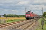 Am Sonntag den 6.7.2014 kommt die 111 101-2 mit einem RE4 Zug bei Wickrathhahn gen Aachen gefahren.
