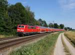Die 111 200 mit einem RE nach München am 27.06.2014 unterwegs bei Langenisarhofen.