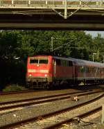 111 038-6 am 1.8.2014 in Korschenbroich mit einem Verstärkerzug auf der RE4 nach Aachen.