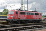DB Lok 111 056-8 steht am 11.05.2023 auf einem Abstellgleis beim badischen Bahnhof.