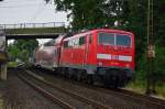 In Osterath auf dem Weg nach Krefeld ist die 111 169 zu sehen, als sie einen RE7 Zug schiebt.