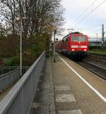 111 112 DB kommt die Kohlscheider-Rampe hoch aus Richtung Neuss,Herzogenrath mit dem RE4 aus Dortmund-Hbf nach Aachen-Hbf und fährt durch Kohlscheid in Richtung