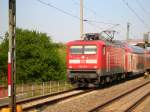 112 116-9 f�hrt mit ihrem RE 1 (HANSE-EXPRESS)in den Hp Prizier ein.