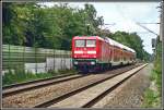 112 159 f�hrt mit beiden Stromabnehmer oben eine RE2  Rhein-Haard-Express  von M�nster (Westf) nach M�nchengladbach.