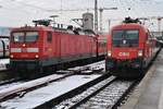 112 106 trifft am 4.1.2019 mit der RB19968 nach Heilbronn Hauptbahnhof im Stuttgarter Hauptbahnhof auf 1116 194 mit dem IC185	nach Zürich HB.