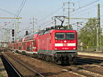 112 102-9 bei der Durchfahrt durch den Bahnhof Berlin Flughafen Schönefeld am 28.