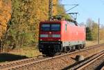 112 185 Lz und mit Flachstelle(n) am 10.11.2021 auf dem Weg von Stralsund Hbf nach Rostock Hbf.