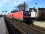 112 135-9 schiebt am 11.02.08 den RE 11 nach D�sseldorf aus dem Bahnhof Lippstadt.