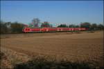 Eine Dortmunder 112er bringt bei Unna den RE7 (RE 29720)  RHEIN-M�NSTERLAND-EXPRESS  von Krefeld Hbf nach M�nster(Westf) Hbf.