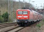 RE 38015 mit BR 112 101-1 nach Eisenh�ttenstadt bei der Einfahrt Berlin Wannsee.