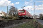 112 158 schiebt bei Westhofen den RE7 (RE 29726)  Rhein-M�nsterland-Express  nach Rheine.