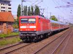 112 152-4 verl�sst Elmshorn mit dem Schlex nach Hamburg Hbf.