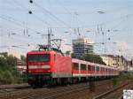 112 167-2 mit einen aus  Modus  - Wagen gebildeten Nahverkehrszug auf den Weg von F�rth / Bayern nach W�rzburg.