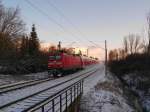 RE 21413 L�beck Hbf - Hamburg Hbf gezogen von 112 155-7 bei der Einfahrt am 5.01.09 in Reinfeld (Holst.).