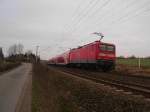 112 167-2 schieben am RE 21422 Hamburg Hbf - L�beck Hbf kurz nach der Ausfahrt aus Reinfeld (Holst.) am 22.01.09 bei Altenfelde.