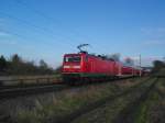112 152-4 schiebt am 25.01.09 den RE 21420 Hamburg Hbf - L�beck Hbf durch Altenfelde Richtung L�beck.