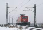 112 145-8 am 15.02.2009 mit einem Schlex nach Hamburg Hbf in Osterr�nfeld.