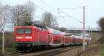 112 172-2 bei der Durchfahrt mit RE 21575 L�beck Hbf - Hamburg Hbf in Altenfelde am 6.04.09.
