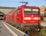 112 140-9 mit RE21407 von L�beck Hbf.nach Hamburg Hbf.kurz vor der Abfahrt im Bahnhof L�beck.(02.05.09)
