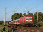 112 148-2 schiebt den RE 21580 aus Hamburg Hbf �ber Bad Oldesloe und Reinfeld nach L�beck Hbf.