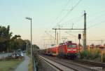 112 143-3 durchf�hrt am Morgen des 9.09.09 kurz nach Sonnenaufgang mit dem RE 21406 Hamburg Hbf - L�beck Hbf den Bahnhof Ahrensburg Richtung Bad Oldesloe.