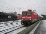 Hier 112 133-4 mit einem RE3 von W�nsdorf-Waldstadt nach Stralsund, bei der Einfahrt am 8.1.2010 in Angerm�nde.