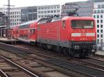 112 165 schiebt den RE nach Cottbus am 03.April 2010 in den Bahnhof Berlin Friedrichstra�e.