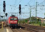 112 175-5 bringt am 20.07.10 den RE 21027 von Kiel Hbf nach Hamburg-Hbf, hier bei der Einfahrt in Neum�nster.