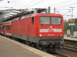 112 154-0 mit ihrer Regionalbahn von Flensburg nach Neum�nster in Rendsburg.