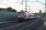 112 125-0 f�hrt mit RE nach Wolfsburg am 13.10.2010 in Lehrte ein.