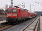Flirtersatz am 17.Januar 2011.Rostocker 112 118-5 und Rostocker Dostos:DABpza 50 80 36-81 001-0,DBpza 50 80 26-81 027-7 und Steuerwagen DBpbzfa 50 80 86-81 001-9 im Einsatz als RE 13008