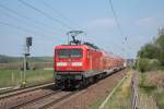 Am 25.04.2011 f�hrt 112 123 mit dem RE3 Richtung Angerm�nde, hier bei Chorin.